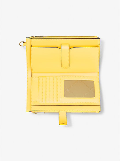 Jet Set Large Ombre Signature Logo Wristlet Daisy Yellow